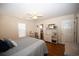 Bright bedroom with ensuite bathroom, stylish bed and decor at 950 Tiffany Ln., North Myrtle Beach, SC 29582