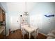 Bright dining area with stylish decor, a decorative whale, and lots of natural light at 950 Tiffany Ln., North Myrtle Beach, SC 29582