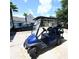 Well maintained blue golf cart located on property with black rims and matching seats at 950 Tiffany Ln., North Myrtle Beach, SC 29582