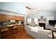 Open concept living room and kitchen with vaulted ceilings, fireplace, and nautical themed decor at 950 Tiffany Ln., North Myrtle Beach, SC 29582