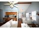 Spacious living room flowing into the dining area and kitchen with wood floors and high ceiling at 950 Tiffany Ln., North Myrtle Beach, SC 29582