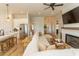 Inviting living room featuring an open layout that connects to the modern kitchen with bar stool seating at Simpson Creek Dr., Loris, SC 29569