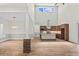 A modern kitchen with wood cabinets, stainless steel appliances and a large island is open to the living area at 1028 Colette Ct, Conway, SC 29526