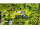 Aerial view of property showcasing wooded boundaries, landscaping, and a private location at 1032 Chelsey Circle, Conway, SC 29526