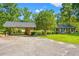 Ranch home with well-maintained landscaping, carport and large driveway at 1032 Chelsey Circle, Conway, SC 29526