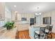 Spacious kitchen featuring granite countertops, stainless steel appliances, and breakfast bar at 1032 Chelsey Circle, Conway, SC 29526
