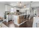 Modern kitchen featuring stainless steel appliances, granite countertops, and island with bar seating at 1048 Meadowoods Dr., Murrells Inlet, SC 29576