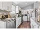 Modern kitchen featuring stainless steel appliances, granite countertops, and ample cabinet space at 1048 Meadowoods Dr., Murrells Inlet, SC 29576