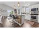 Bright kitchen featuring stainless steel appliances, granite countertops, and island with bar seating at 1048 Meadowoods Dr., Murrells Inlet, SC 29576