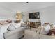 Cozy living room featuring plush seating, modern entertainment center, and stylish decor at 1048 Meadowoods Dr., Murrells Inlet, SC 29576
