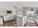 Open floorplan shows living room, kitchen and dining area with lots of natural light at 1048 Meadowoods Dr., Murrells Inlet, SC 29576