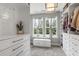 Organized walk-in closet featuring custom built-ins, ample storage, and natural light at 1048 Meadowoods Dr., Murrells Inlet, SC 29576