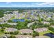 Expansive aerial view of a residential community with lakes and lush greenery, showcasing the neighborhood layout at 1057 Stanton Pl. # 1057, Myrtle Beach, SC 29579