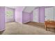 Bright purple bedroom with natural light from the window at 1057 Stanton Pl. # 1057, Myrtle Beach, SC 29579