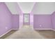 Bright purple bedroom with large window at 1057 Stanton Pl. # 1057, Myrtle Beach, SC 29579