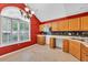 Bright kitchen featuring light cabinetry, white appliances, and large window at 1057 Stanton Pl. # 1057, Myrtle Beach, SC 29579