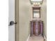 A classic powder room featuring a vanity with carved legs and a unique mirror at 1057 Stanton Pl. # 1057, Myrtle Beach, SC 29579