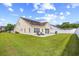 Expansive backyard featuring a well-maintained lawn and a patio area perfect for outdoor entertaining and relaxation at 107 Fox Den Dr., Murrells Inlet, SC 29576