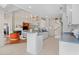 Open kitchen with a breakfast bar overlooking the living area, creating a welcoming space for gatherings at 107 Fox Den Dr., Murrells Inlet, SC 29576
