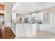 Bright, updated kitchen with white cabinets, stainless steel appliances, and a breakfast bar for casual dining at 107 Fox Den Dr., Murrells Inlet, SC 29576