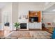 Comfortable living area with a fireplace, built-in shelving, and an open layout at 107 Fox Den Dr., Murrells Inlet, SC 29576