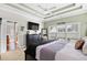 Inviting main bedroom boasts tray ceilings, a large window and TV at 107 Fox Den Dr., Murrells Inlet, SC 29576