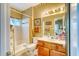 A functional bathroom including a shower/tub combo, toilet, and vanity with storage at 1102 Indian Wells Ct. # 2, Garden City Beach, SC 29576