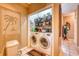 Laundry area with appliances and plenty of storage space at 1102 Indian Wells Ct. # 2, Garden City Beach, SC 29576