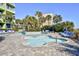 Relaxing hot tub area surrounded by lush greenery and comfortable lounge chairs at 1105 S Ocean Blvd. # 330, Myrtle Beach, SC 29577