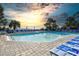 Relax by the pool with scenic ocean views and comfortable lounge chairs at sunset at 1105 S Ocean Blvd. # 330, Myrtle Beach, SC 29577