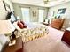 Bedroom showcasing natural light, carpeted floors, ceiling fan, and furniture that enhances its functionality at 112 Robin Dr., Georgetown, SC 29440