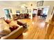 Inviting living room with hardwood floors, comfortable seating, and seamless flow to dining area at 112 Robin Dr., Georgetown, SC 29440