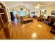 Bright living room with hardwood floors, lots of natural light, and views of the backyard at 112 Robin Dr., Georgetown, SC 29440