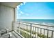 Ocean view from a balcony with chairs at 1200 S Ocean Blvd. # 20506, Myrtle Beach, SC 29577