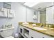 Granite counters accent this well-lit bathroom at 1200 S Ocean Blvd. # 20506, Myrtle Beach, SC 29577