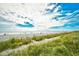 View of the ocean with dunes and beach access at 1200 S Ocean Blvd. # 20506, Myrtle Beach, SC 29577