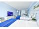 Stylish bedroom featuring two beds, kitchenette, TV, and dining area at 1200 S Ocean Blvd. # 20506, Myrtle Beach, SC 29577