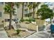 Inviting condo entrance with stairway surrounded by tropical landscaping at 1200 S Ocean Blvd. # 20506, Myrtle Beach, SC 29577