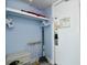 Hallway features an evacuation map, safe, and ironing board at 1200 S Ocean Blvd. # 20506, Myrtle Beach, SC 29577