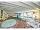 Relaxing indoor pool area with hot tub and plenty of seating at 1200 S Ocean Blvd. # 20506, Myrtle Beach, SC 29577