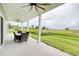 Covered back porch featuring a patio set and great views at 125 Oak Bay Dr., Georgetown, SC 29440