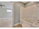 Modern bathroom with a bright white shower and neutral paint, complemented by hardwood floors at 125 Oak Bay Dr., Georgetown, SC 29440