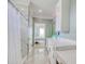 Bathroom featuring double vanity, large mirror, and access to walk in shower and bedroom at 125 Oak Bay Dr., Georgetown, SC 29440