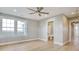 A spacious bedroom with light-colored floors and an adjacent bathroom at 125 Oak Bay Dr., Georgetown, SC 29440