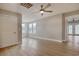 A spacious bedroom featuring hardwood floors, recessed lighting, and access to the private deck at 125 Oak Bay Dr., Georgetown, SC 29440