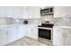 Modern kitchen with stainless steel appliances, and white cabinets at 125 Oak Bay Dr., Georgetown, SC 29440