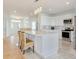 Bright kitchen with large island, pendant lighting, stainless appliances, and open floor plan at 125 Oak Bay Dr., Georgetown, SC 29440
