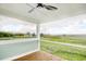 Enjoy stunning views from this porch with wooden floors and views of the marsh at 125 Oak Bay Dr., Georgetown, SC 29440