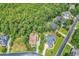 Birds eye view of the beautiful manicured lawn, mature landscaping, and backyard of this lovely home at 128 Knotty Pine Way, Murrells Inlet, SC 29576