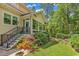 This is a nice view of the backyard that has a screened in porch at 128 Knotty Pine Way, Murrells Inlet, SC 29576